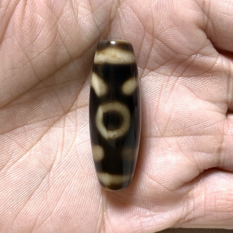 Garuda and Two Eyed Dzi Bead with Blood Spots