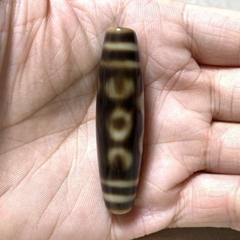 Crescent and Seven Eyed Dzi Bead with Blood Spots