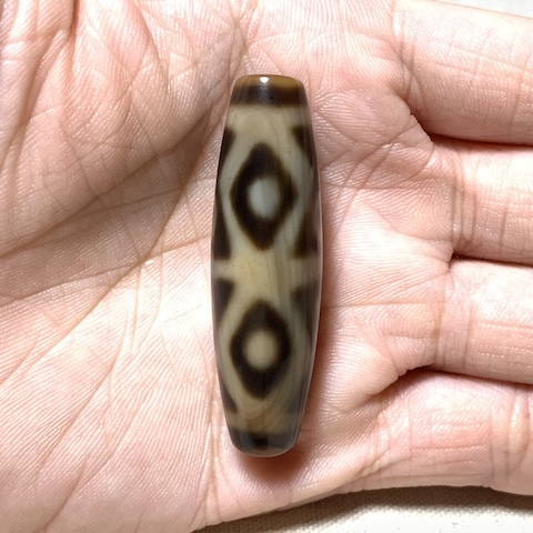 Vajra and Four Eyed Dzi Bead with Blood Spots