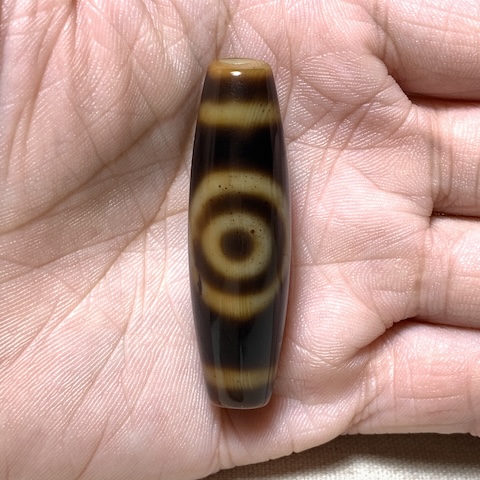 Dharma Hat and Two Eyed Dzi Bead with Blood Spots