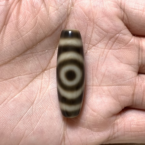 Lotus and Two Eyed Dzi Bead