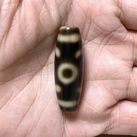 Garuda and Two Eyed Dzi Bead with Blood Spots