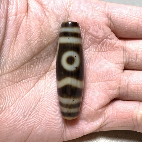 Dharma Hat and Three Eyed Dzi Bead with Blood Spots