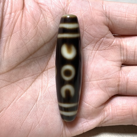 Crescent and Seven Eyed Dzi Bead